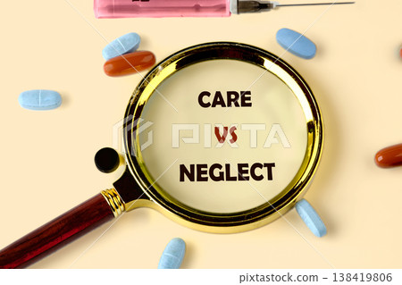 A golden magnifying glass reveals the powerful phrase Care vs Neglect on a light surface 138419806