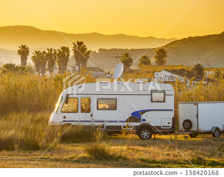 Caravan with satellite dish on roof camping on spanish nature 138420168