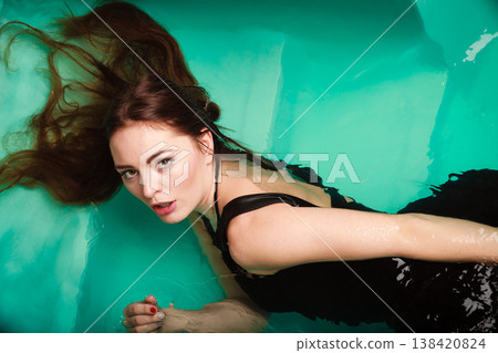 Sexy seductive woman in water. 138420824