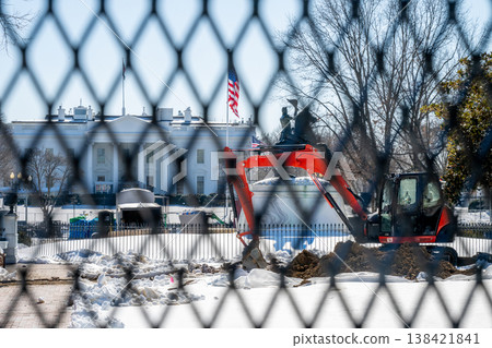 Construction work is happening near the White House as workers clear snow and dirt in Washington D.C Construction work is happening near the White House as workers clear snow and dirt in Washington D.C 138421841