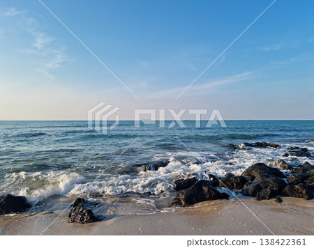 This is Gwakji Beach in Jeju Island, which has basalt rocks. 138422361