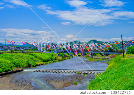 [Kanagawa] The carp streamers of Suzukawa River and the magnificent view of Mt. Fuji, shining brightly in the clear May sky. 138422735