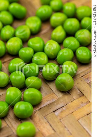 Fresh green beans on a bamboo basket Fresh green beans on a bamboo basket 138422863