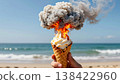 Surreal concept of an exploding ice cream cone. Global warming and heatwave concept. Atomic Summer. nuclear mushroom cloud is erupting from the cone 138422960