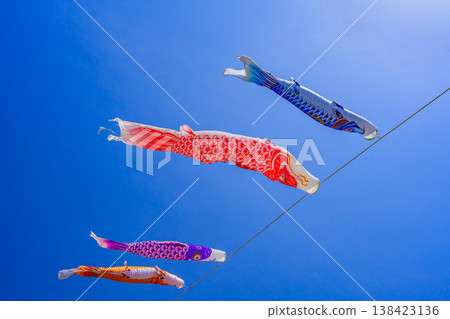 Carp streamers swimming in the blue sky: A scene of Children's Day under a clear May sky (copy space available) Carp streamers swimming in the blue sky: A scene of Children's Day under a clear May sky (copy space available) 138423136