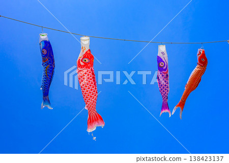 Carp streamers swimming in the blue sky: A scene of Children's Day under a clear May sky (copy space available) Carp streamers swimming in the blue sky: A scene of Children's Day under a clear May sky (copy space available) 138423137