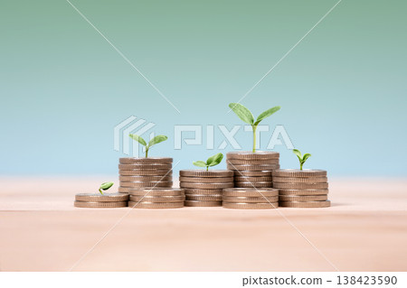 Young green seedlings plant growing on increasing coin stacking for money saving deposit and investment dividend growth concept, goals achievement and business success Young green seedlings plant growing on increasing coin stacking for money saving deposit and investment dividend growth concept, goals achievement and business success 138423590