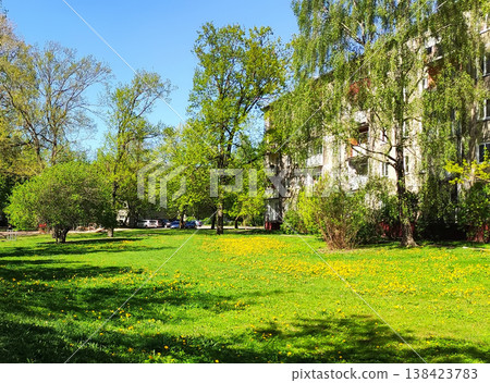 Modern cityscape with natural green spaces in springtime. Ideal for eco-friendly visuals, tourism imagery, and editorial design. 138423783