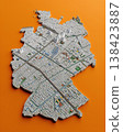Miniature cityscape shaped as Germany map on flat background - ai generated 138423887