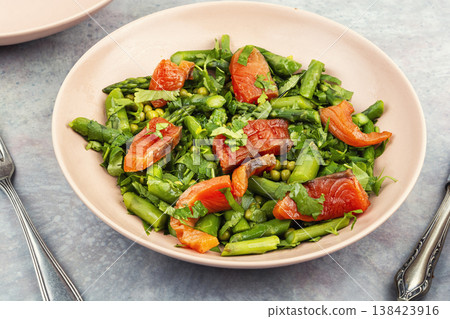 Smoked trout and asparagus salad, fresh green dish. 138423916