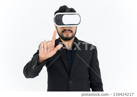business man in informal suit wearing VR goggles pointing in the air while standing isolated on white background. concept of Metaverse, virtual reality, future, technology, and internet of things. business man in informal suit wearing VR goggles pointing in the air while standing isolated on white background. concept of Metaverse, virtual reality, future, technology, and internet of things. 138424217