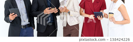 Banner cover design. Close up a group of business people using gadgets or smartphones while standing in a row. isolated on white background. Banner cover design. Close up a group of business people using gadgets or smartphones while standing in a row. isolated on white background. 138424226