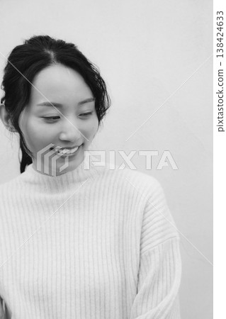 A monochrome, retro-style portrait of a daughter returning to her family home. A monochrome, retro-style portrait of a daughter returning to her family home. 138424633