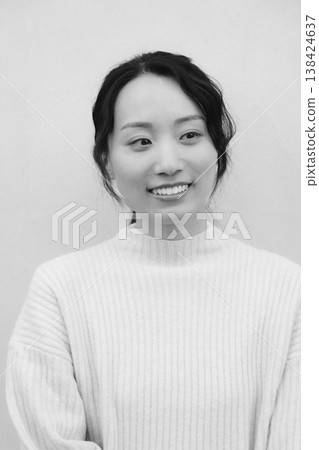 A monochrome, retro-style portrait of a daughter returning to her family home. A monochrome, retro-style portrait of a daughter returning to her family home. 138424637