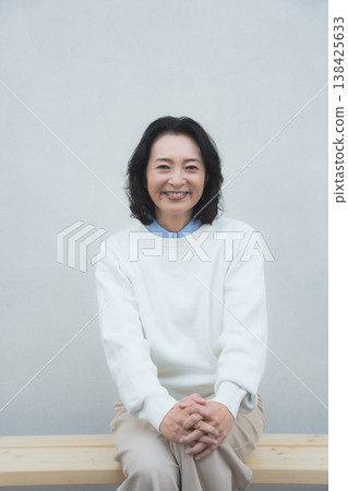 A retro-style portrait of my lively mother from my childhood home. 138425633
