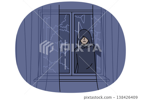 Stalker peers out of apartment window at night, causing fear due to violation of personal space 138426409
