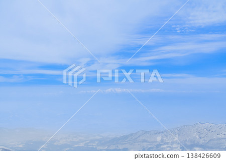 [Clear skies] Zao's snow monsters, pure white frost-covered trees standing out against the deep blue sky, and a spectacular winter landscape. 138426609