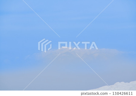 [Clear skies] Zao's snow monsters, pure white frost-covered trees standing out against the deep blue sky, and a spectacular winter landscape. 138426611