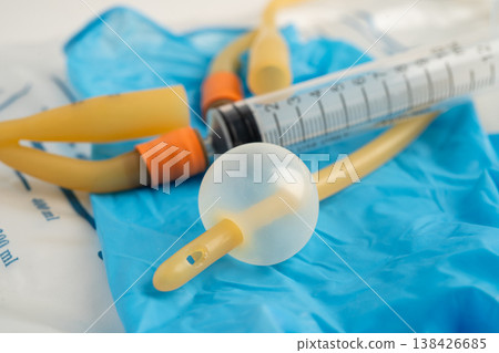 Foley urinary catheter with urine bag for disability or patient in hospital. 138426685