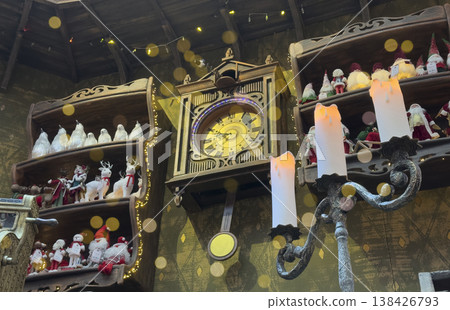 Golden clock symbolizing New Year countdown and festive celebration at midnight. Holiday decoration 138426793