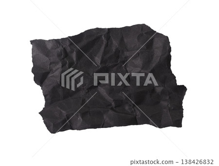 Rough black paper piece with torn jagged edge and textured grunge surface. Abstract wrinkled Rough black paper piece with torn jagged edge and textured grunge surface. Abstract wrinkled 138426832