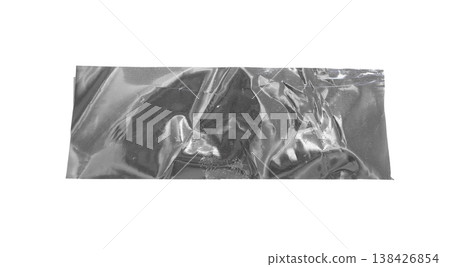 Crumpled metallic foil strip with reflective surface and irregular folds. Shiny texture and abstract Crumpled metallic foil strip with reflective surface and irregular folds. Shiny texture and abstract 138426854