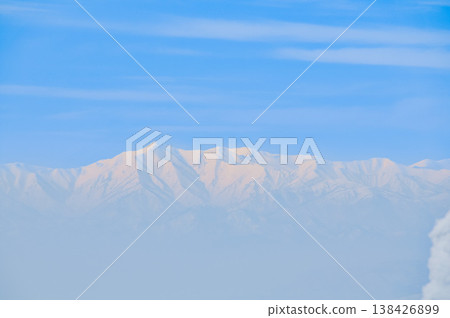 [Clear skies] Zao's snow monsters, pure white frost-covered trees standing out against the deep blue sky, and a spectacular winter landscape. 138426899