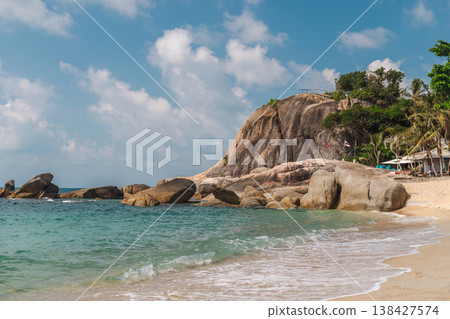 Tropical sandy beach with turquoise water and large granite rocks at Lamai Beach Koh Samui Thailand Tropical sandy beach with turquoise water and large granite rocks at Lamai Beach Koh Samui Thailand 138427574