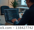 工程師在筆記型電腦上編程的背影。 138427742