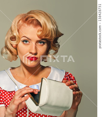 Beautiful pin-up girl with little bag 138428731