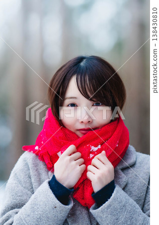 A young lady who played a muffler A young lady who played a muffler 138430810