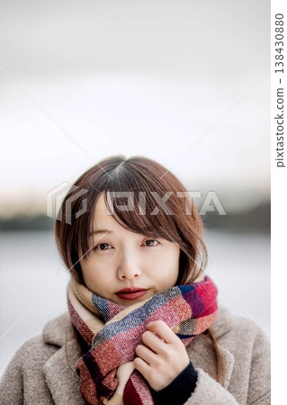 A young lady who played a muffler 138430880