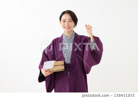 A woman in a yukata A woman in a yukata 138431855