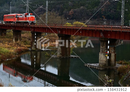 DE10 crossing a red iron bridge DE10 crossing a red iron bridge 138431912