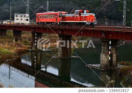 DE10 crossing a red iron bridge DE10 crossing a red iron bridge 138431917