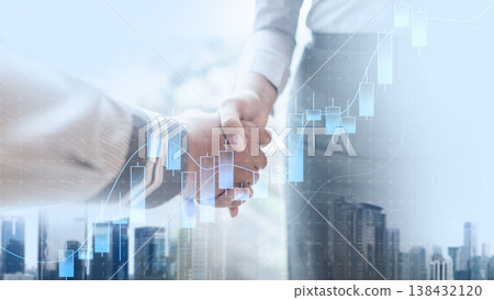 Business people shaking hands against a city skyline with overlaid financial stock market charts, representing a successful partnership, investment, and economic growth 138432120