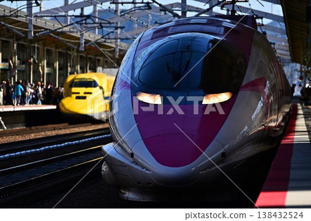 Shinkansen arriving at the station 138432524