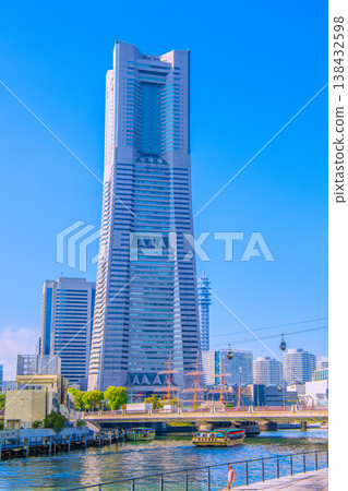 Yokohama cityscape, Japan, April 2nd. A view from in front of Yokohama City Hall, showing houseboats, Yokohama Landmark Tower, ropeway, and more. Yokohama cityscape, Japan, April 2nd. A view from in front of Yokohama City Hall, showing houseboats, Yokohama Landmark Tower, ropeway, and more. 138432598