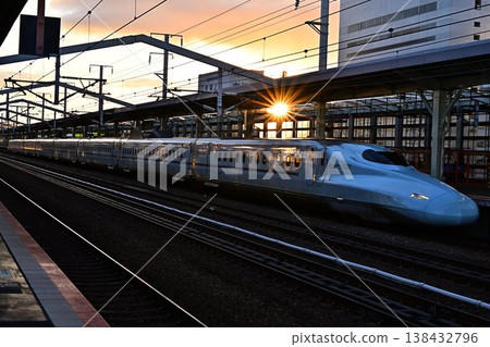 Shinkansen arriving at the station Shinkansen arriving at the station 138432796