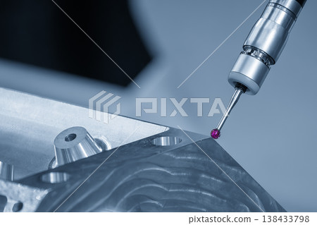 Advanced multi-axis CMM machine measuring a high-precision aluminum engine block for automotive quality inspection. Advanced multi-axis CMM machine measuring a high-precision aluminum engine block for automotive quality inspection. 138433798