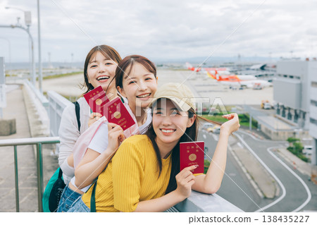 Three women taking a commemorative photo at the airport. (Photo courtesy of Kansai International Airport (KIX)) Three women taking a commemorative photo at the airport. (Photo courtesy of Kansai International Airport (KIX)) 138435227
