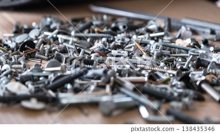 Assortment of metal products: bolts, screws, nails, washers, fasteners, related to repair and construction production works, hardware assembly. Assortment of metal products: bolts, screws, nails, washers, fasteners, related to repair and construction production works, hardware assembly. 138435346