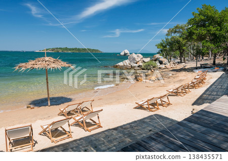 sunbeds and bamboo parasols of cafe by sea, Ko Man Klang, Rayong sunbeds and bamboo parasols of cafe by sea, Ko Man Klang, Rayong 138435571