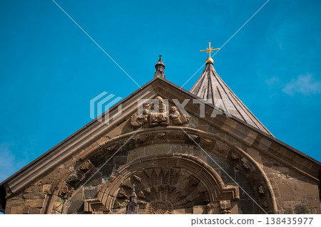 Detailed view of 11th-century Georgian Orthodox cathedral with conical dome and religious reliefs Detailed view of 11th-century Georgian Orthodox cathedral with conical dome and religious reliefs 138435977