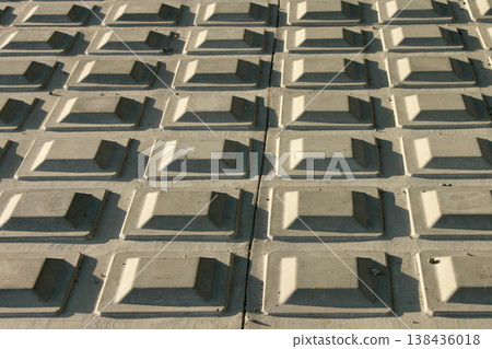 Geometric concrete block patterns, light and shadow 138436018