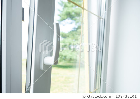 Plastic double-glazed window opened for ventilation, quality hardware, business installation for home and office, sound insulation and comfort. 138436101