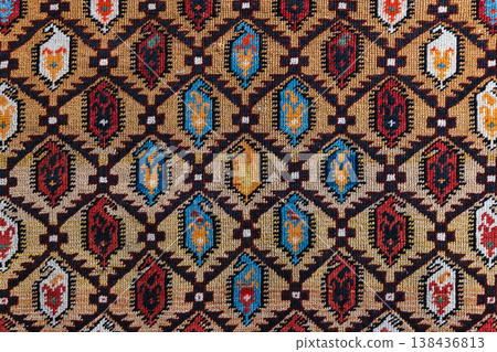 Close-up of a traditional patterned oriental rug textile Close-up of a traditional patterned oriental rug textile 138436813