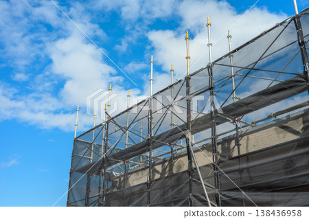 Blue sky and exterior wall repair work Blue sky and exterior wall repair work 138436958