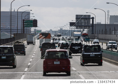 Cars driving on the highway 138437434
