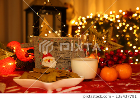 Waiting For Santa With Milk Cookies And Festive Lantern Glow 138437791